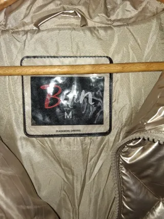 Plumas dorado mujer talla M