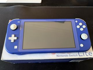 Nintendo Switch Lite Azul + Caja + Funda