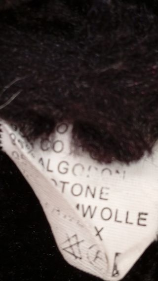 Chaqueta bomber negra capucha, pelo y lentejuelas