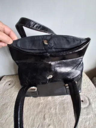 Bolsos negros de piel ,principios de 1920