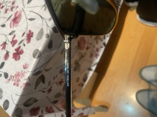 Gafas de sol Ray-Ban Clubmaster negras y doradas