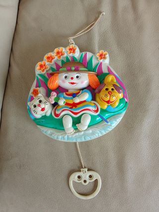 Carillon bimba con gatto e cane