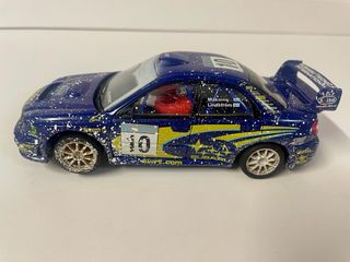 Scalextric Subaru Impreza efecto nieve Makinen.