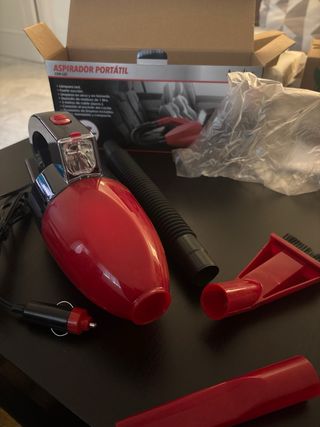 Aspirador portátil con luz.