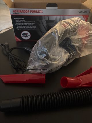Aspirador portátil con luz.