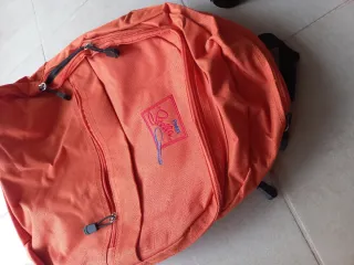 Zaino arancione unisex mai usato