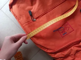 Zaino arancione unisex mai usato