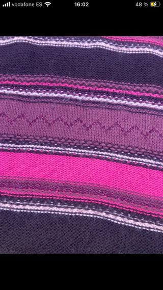 Jersey cuello alto sin mangas rayas