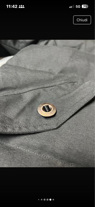 Giacca Moose Knuckles nera con cappuccio in pellic