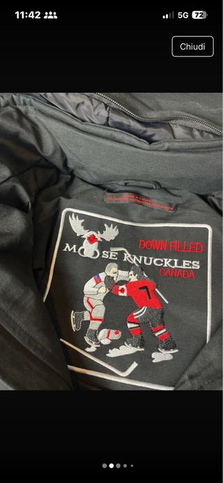 Giacca Moose Knuckles nera con cappuccio in pellic