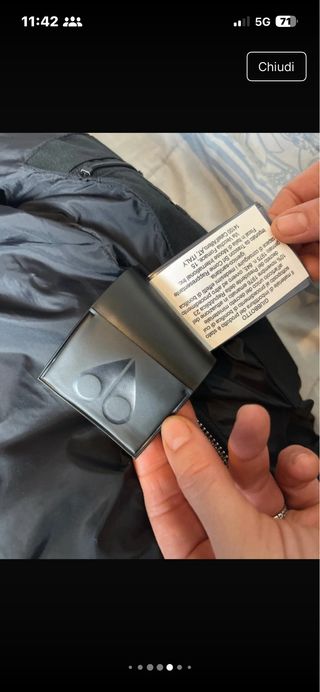 Giacca Moose Knuckles nera con cappuccio in pellic