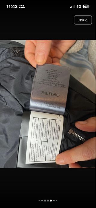 Giacca Moose Knuckles nera con cappuccio in pellic