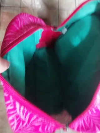 Mochila rosa con estampado floral