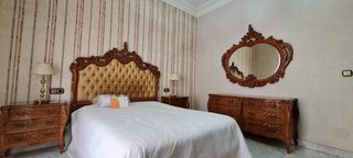 Dormitorio nogal tallado a mano