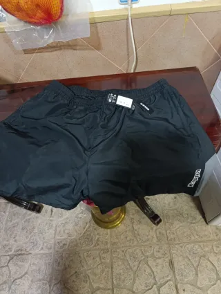 Pantalones cortos Kappa negros y grises