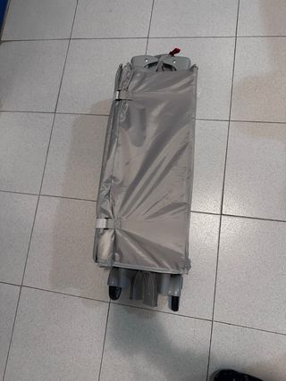 Cuna de viaje gris
