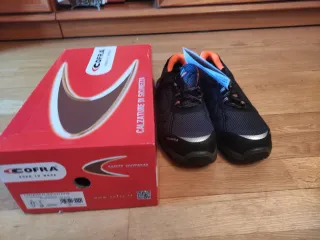 Zapatos de seguridad COFRA negros y naranjas
