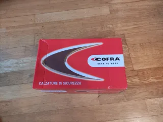 Zapatos de seguridad COFRA negros y naranjas