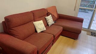 Sofá modular rojo con masaje y cama