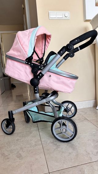 Cochecito de muñecas rosa y turquesa