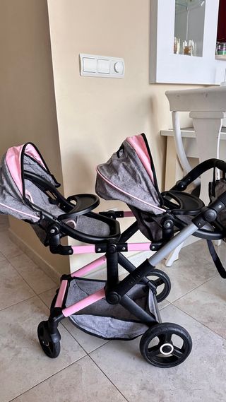 Cochecito de muñecas rosa y turquesa