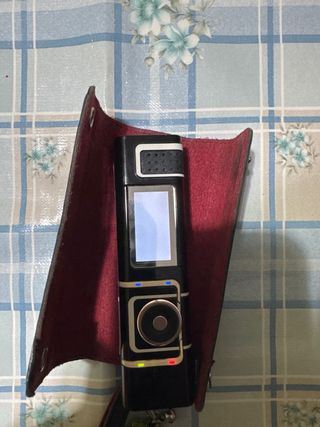 Nokia 7280 con funda y cargador original