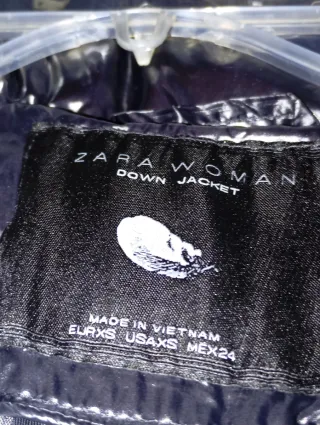 Cazadora negra brillo mujer