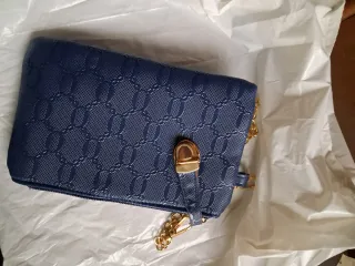 Tres Bolsos  de hombro.