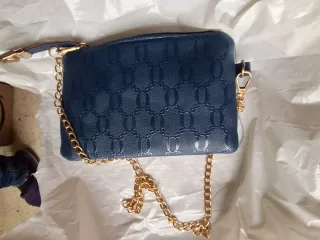 Tres Bolsos  de hombro.