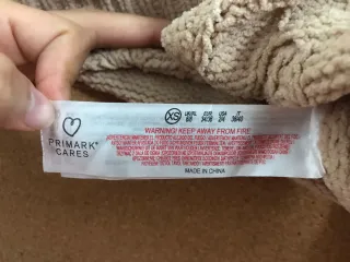 Jersey beige trenzado cuello alto