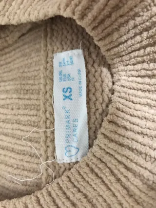 Jersey beige trenzado cuello alto