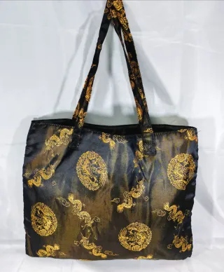 Borsetta orientale nera con draghi dorati