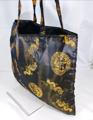 Borsetta orientale nera con draghi dorati