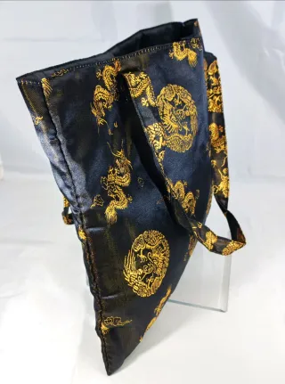 Borsetta orientale nera con draghi dorati