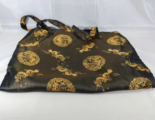 Borsetta orientale nera con draghi dorati