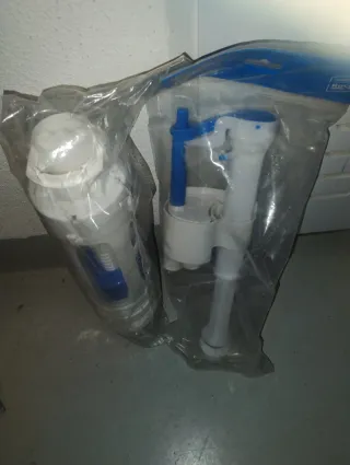 Descargador y flotador inodoro