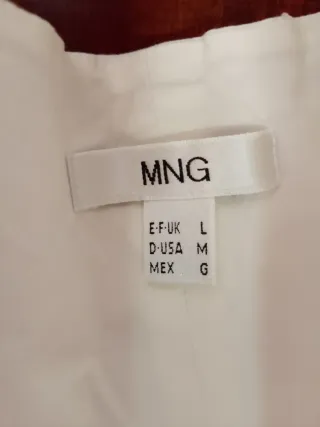 Blusa blanca sin mangas Talla M