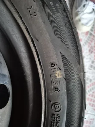 4 Llantas de acero con neumáticos y tapacubos 206