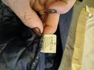 Piumino uomo con maniche felpate