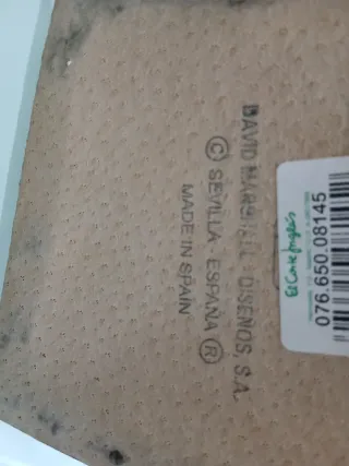 Candelabro de metal dorado y plateado