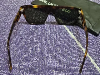 Gafas de sol Dior negras y doradas