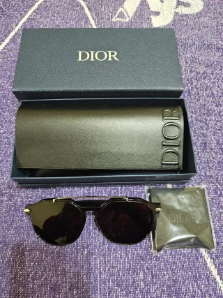 Gafas de sol Dior negras y doradas