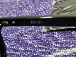 Gafas de sol Dior negras y doradas