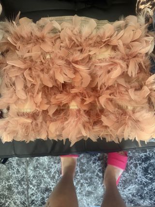 Falda Stradivarius plumas rosa