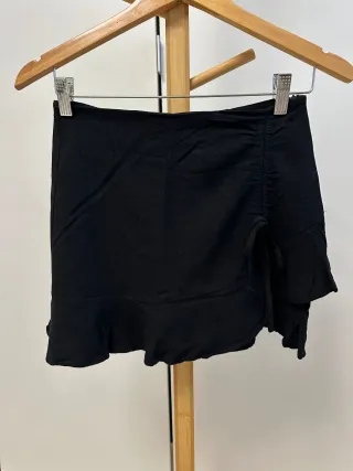 Conjunto falda pantalón y top tirantes negro