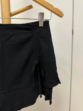 Conjunto falda pantalón y top tirantes negro