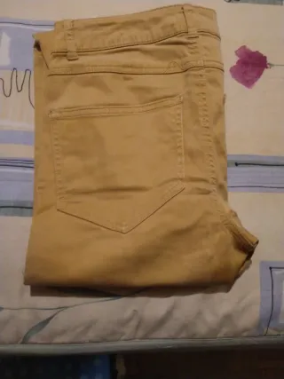 Pantalones pitillo mujer granate y Dorado.