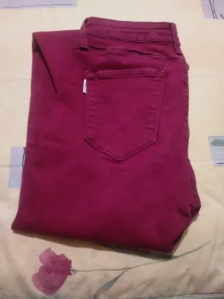 Pantalones pitillo mujer granate y Dorado.