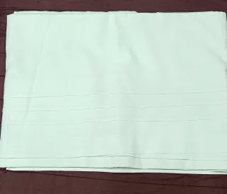 Sábanas encimeras blancas y azules