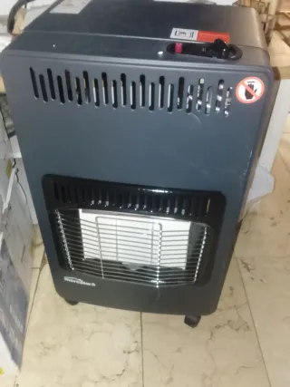 Estufa de gas negra me quedan 9